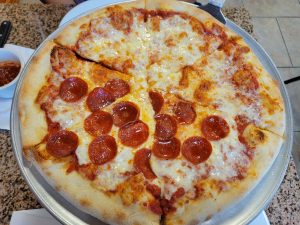 Half Cheese and half pepperoni pizza