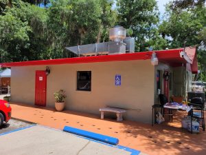 Voo la Voo Cafe New Smyrna Beach Restaurant Review image of building entrance at rear of building