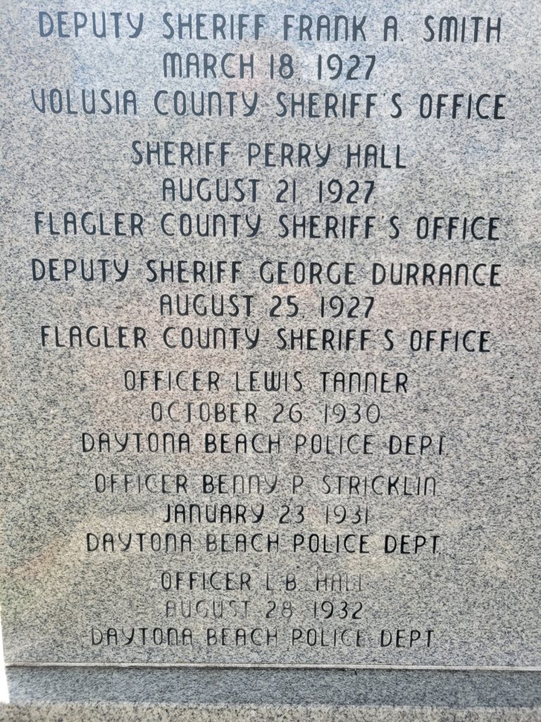 Detail of monument showing name of Lewis Tanner Daytona Beach Police DepartmentIn Memory