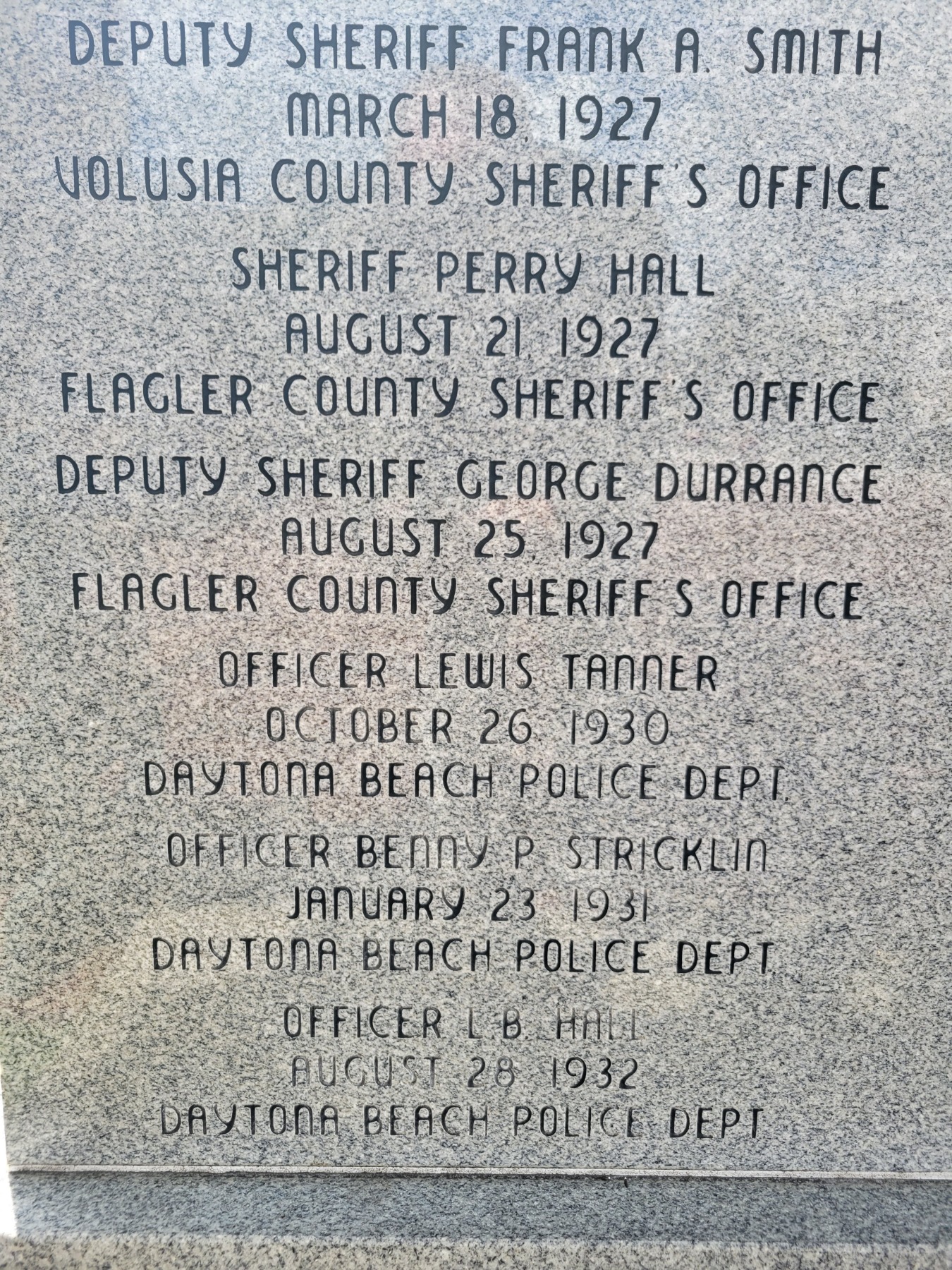 Detail of monument showing name of Lewis Tanner Daytona Beach Police Department In Memory